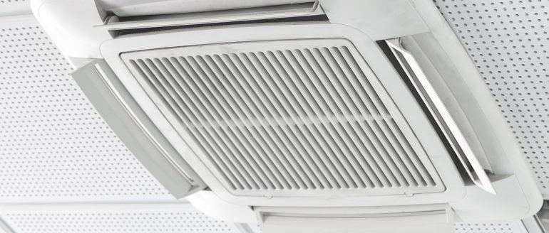 An AC unit in a ceiling