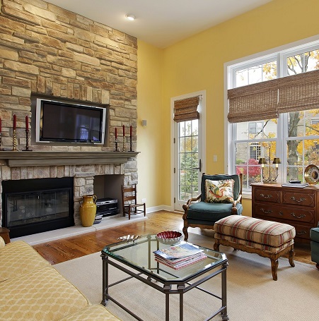 A beautiful living room with yellow walls